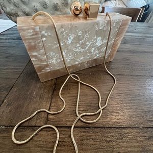 Very cute light pink/coral pearl clutch